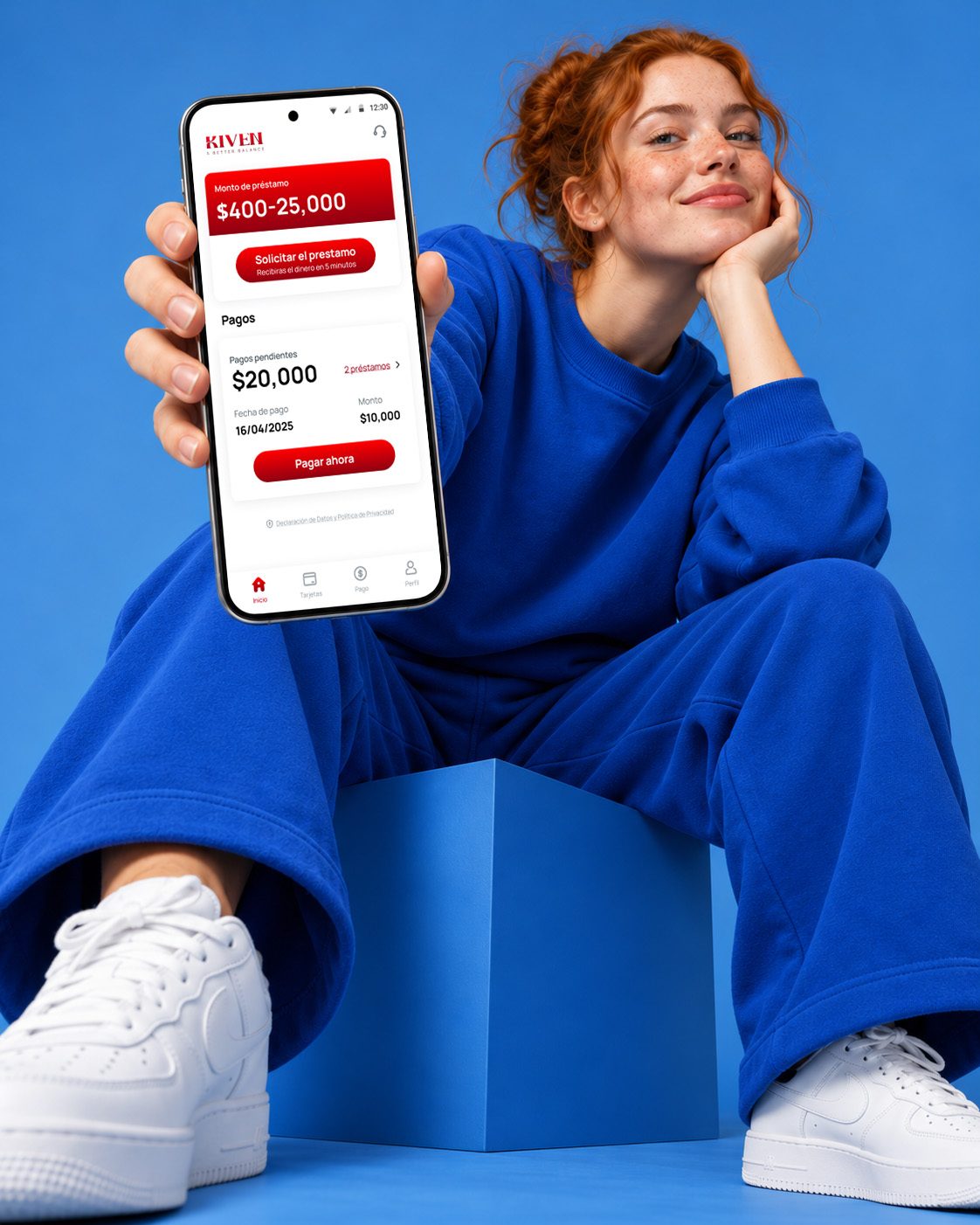 A woman in a blue tracksuit showing the Kiven app